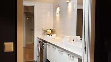 Shower, towels, soap, toilet paper