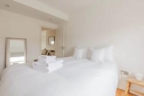 2 chambres, fer et planche à repasser, Wi-Fi, draps fournis