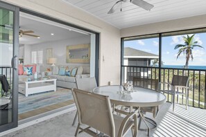 Outdoor dining - Gulf front newly remodeled, 2 bedroom 2 bath top floor corner unit (Sanibel)