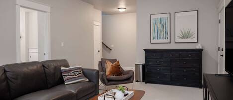 TV, fireplace, books, offices