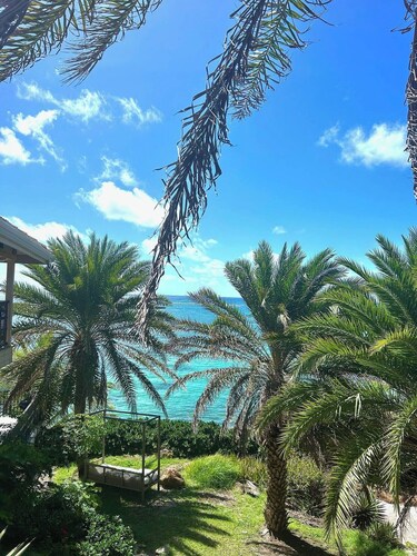 Waterfront Spacious 5-bedroom villa in Mamora Bay,Watersports Games  room,  