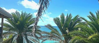 Waterfront Spacious 5-bedroom villa in Mamora Bay,Watersports Games  room,  