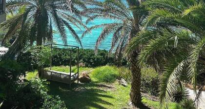 Waterfront Spacious 5-bedroom villa in Mamora Bay,Watersports Games room,