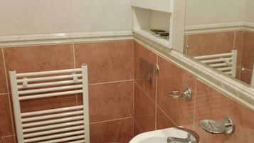 Shower, deep-soaking bathtub, hair dryer, towels