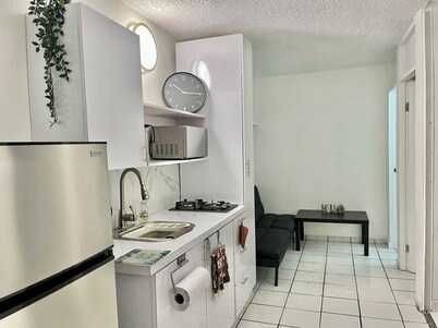 Modern apartment steps from the beach