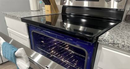 New Charming 3-bedroom home each w/TVs, 6 Beds, 2 Full Bath, Corner lot parking.