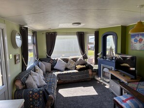 Ferienhütte | Wohnbereich | Kamin