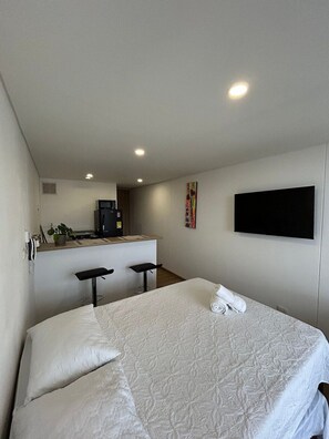 1 habitación, tabla de planchar con plancha, wifi y ropa de cama 