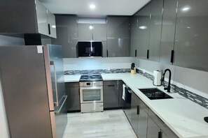 Fridge, microwave, stovetop, dishwasher - Urban Hideaway - 201 (Tulsa)