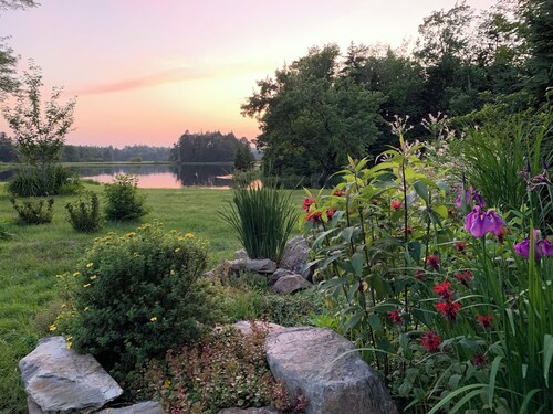 Private cottage on 8 wooded and flower-filled acres at Lake Wentworth and the Wentworth River 