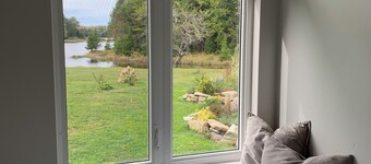 Private cottage on 8 wooded and flower-filled acres at Lake Wentworth and the Wentworth River 