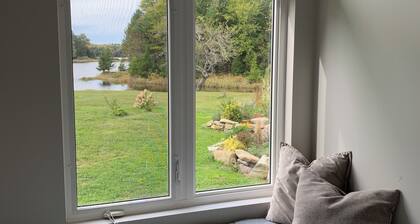 Private cottage on 8 wooded and flower-filled acres at Lake Wentworth and the Wentworth River