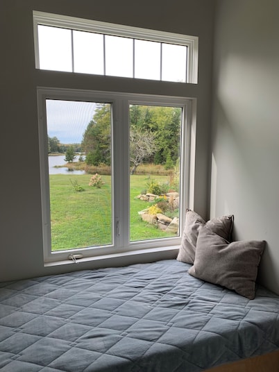 Private cottage on 8 wooded and flower-filled acres at Lake Wentworth and the Wentworth River 