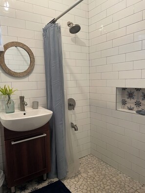 Shower, towels, toilet paper