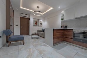 Junior Suite, Balcony, City View | In-room safe, laptop workspace, blackout drapes, soundproofing - The Pelican Hotel Cantonments Accra (Accra)