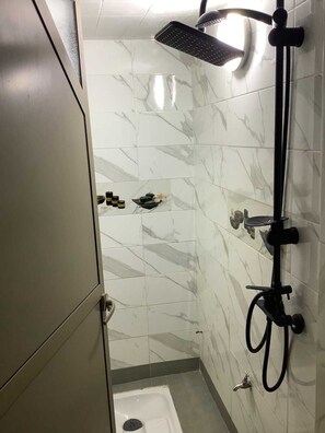 Jetted bath, hair dryer, bidet, towels