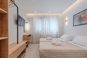 4 chambres, coffre-fort, fer et planche à repasser