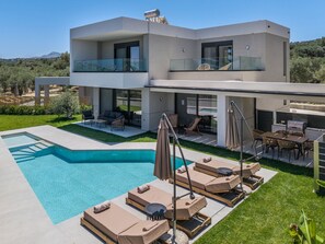 A modern two-story house with a swimming pool, outdoor seating, and a barbecue area. - Thalassa,Picturesque village,Near beach, tavern,market (Gerani)