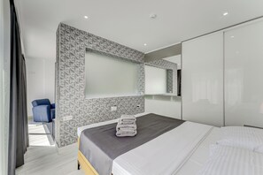 1 slaapkamer, een strijkplank/strijkijzer, wifi, beddengoed