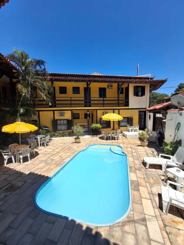 Indoor pool, open 7:00 AM to midnight, pool umbrellas, pool loungers