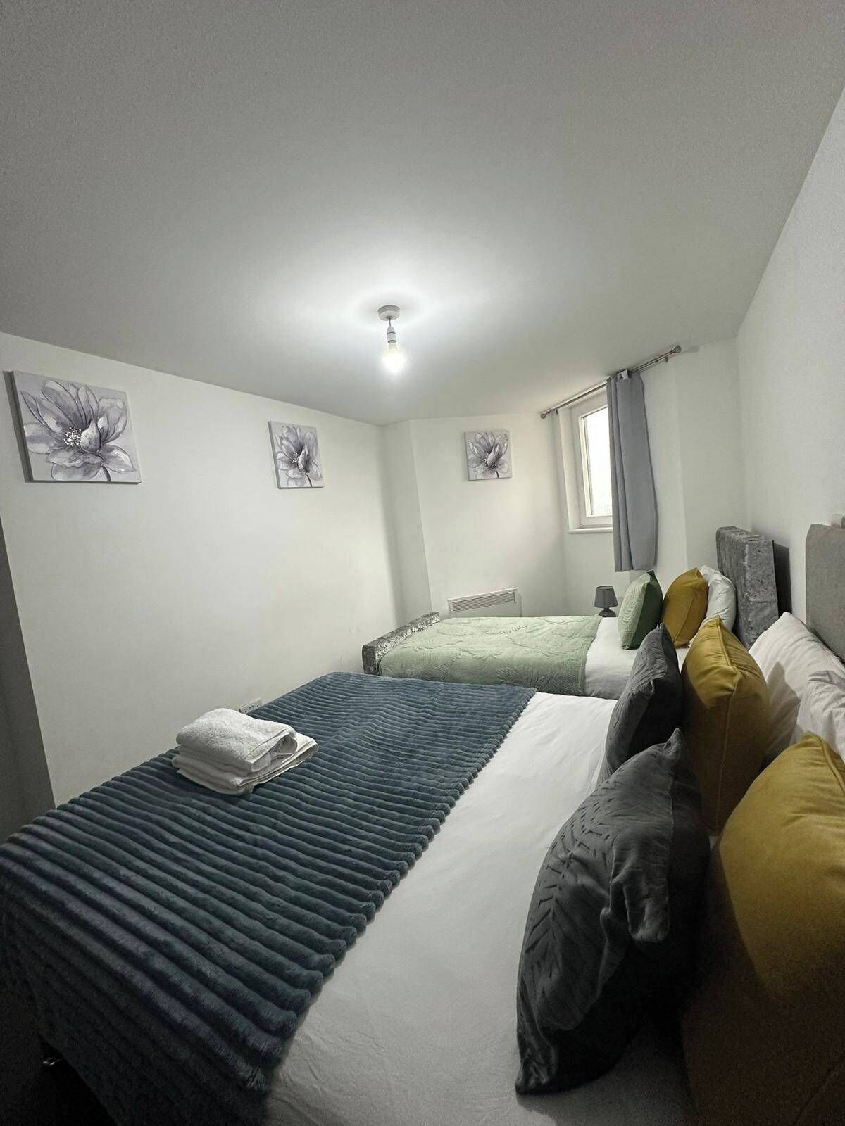1 dormitorio, tabla de planchar con plancha, wifi gratis y ropa de cama