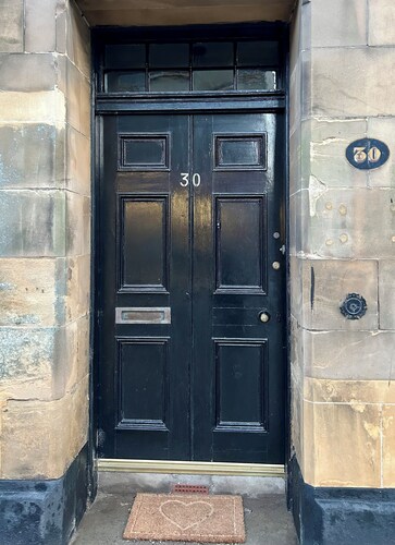 Spacious 4 bedroom townhouse with traditional features and private courtyard