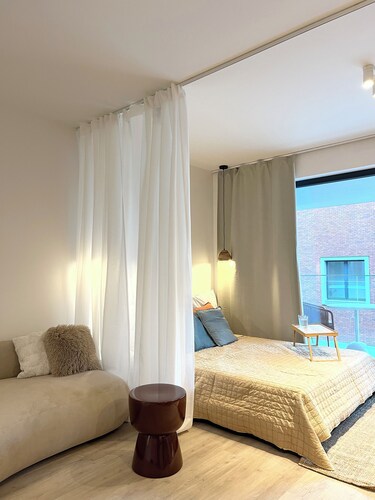 Style apartment, 10 min from the Center, with AC and free parking