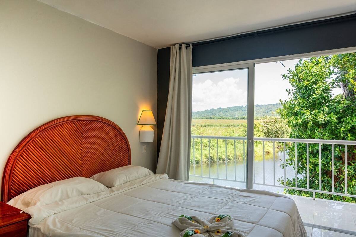 Double Room, Balcony, Pool View | Bathroom | Shower, free toiletries, towels, soap