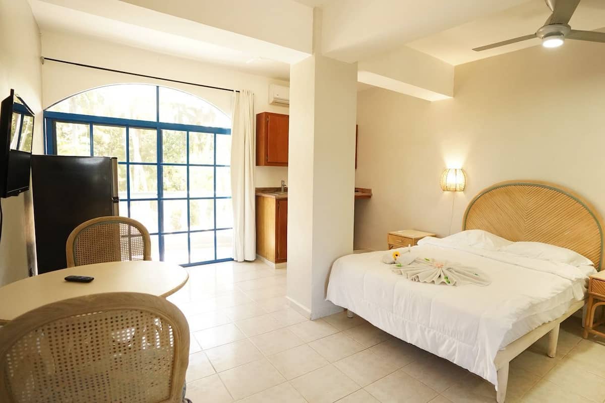 Single Room, Balcony, Pool View | In-room safe, laptop workspace, blackout drapes, WiFi (free)