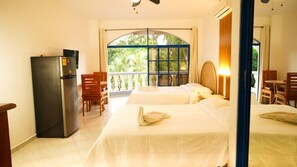 Quadruple Room, Balcony, Pool View | In-room safe, laptop workspace, blackout drapes, free WiFi - Hotel El Koaba (Cabarete)
