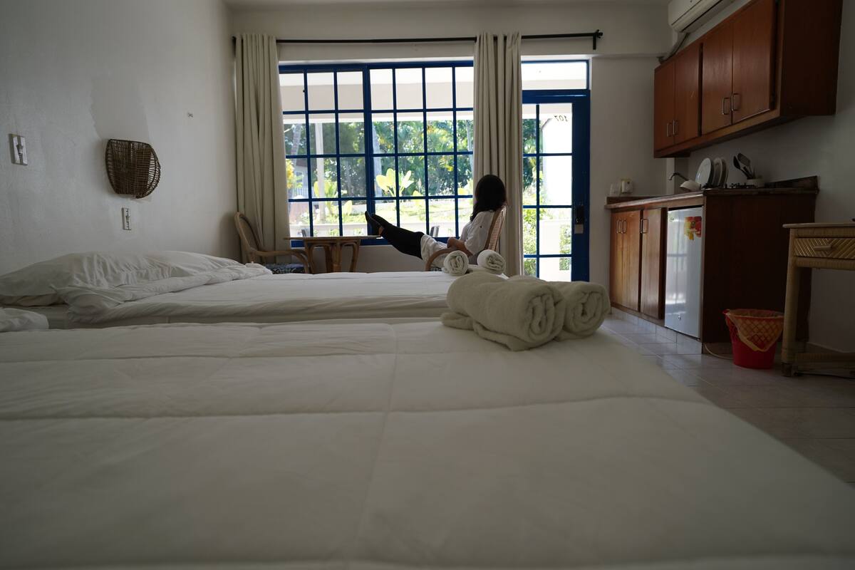 Quadruple Room, Balcony, Pool View | In-room safe, laptop workspace, blackout drapes, WiFi (free)