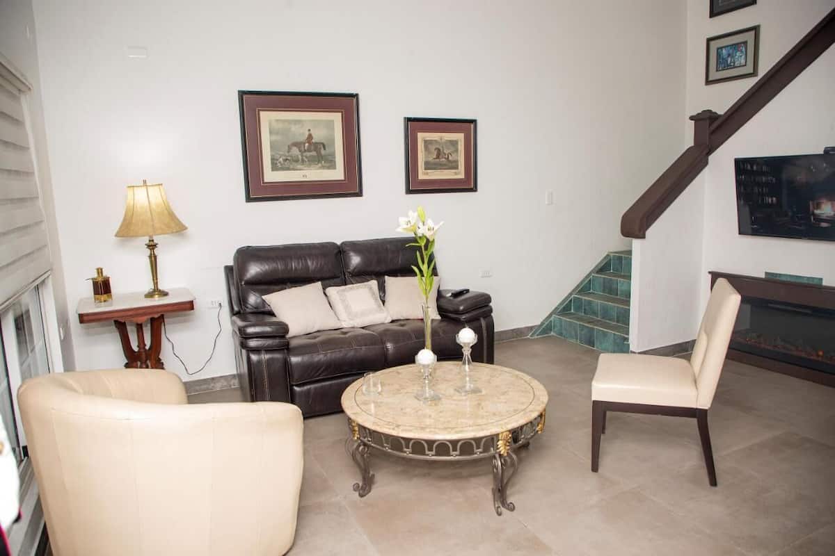 Family Suite | Living area | TV