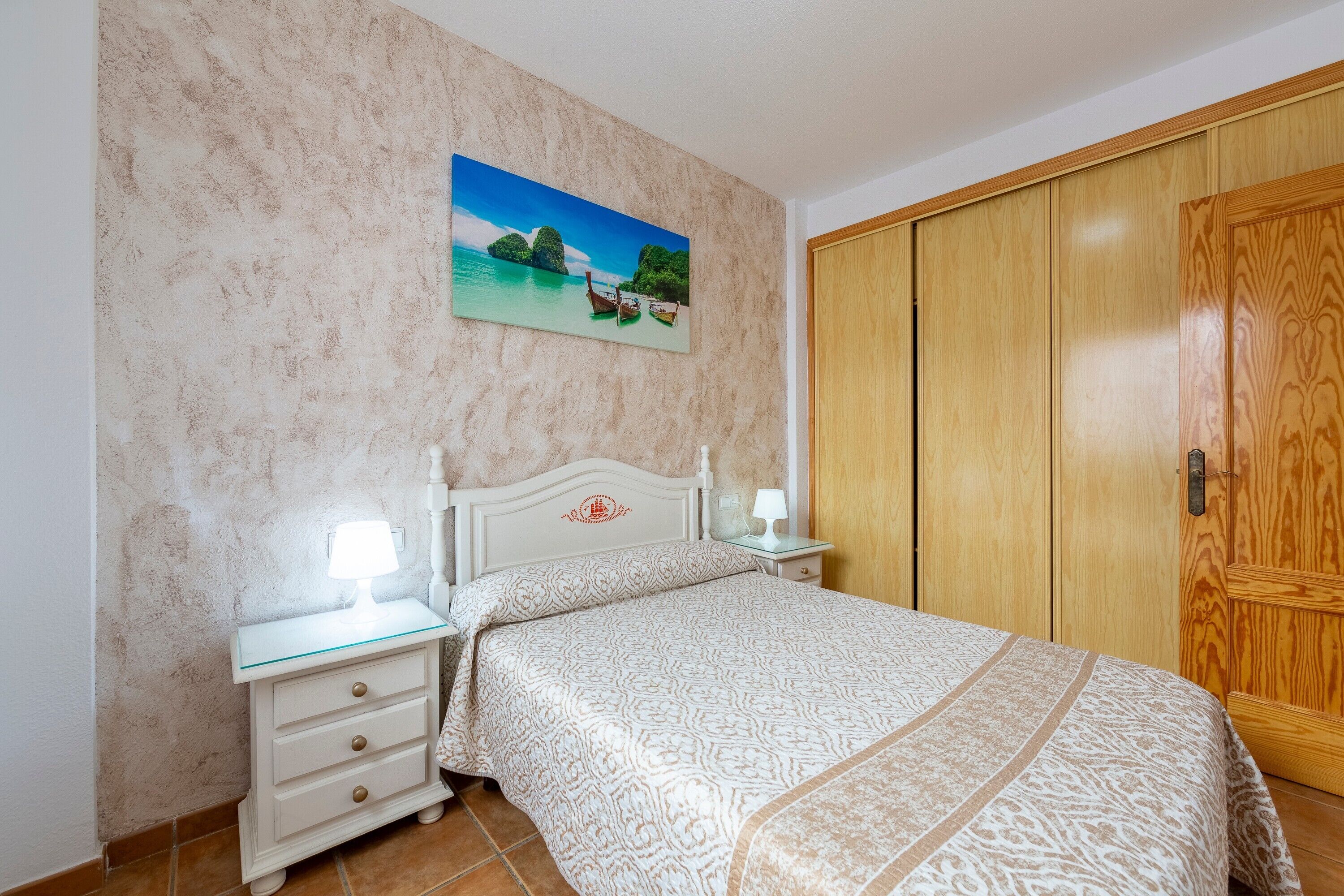 2 slaapkamers, een strijkplank/strijkijzer, beddengoed