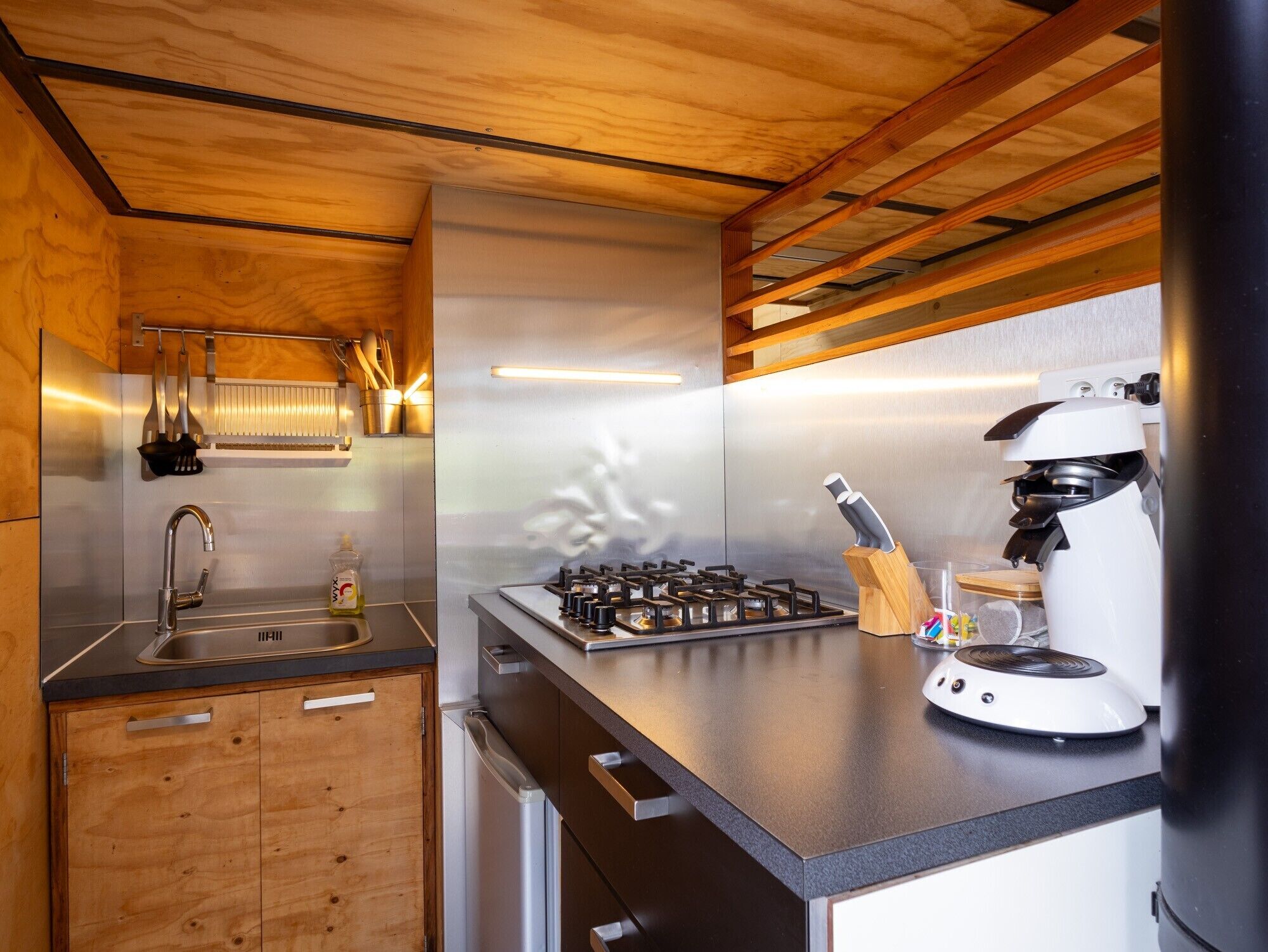 Fridge, stovetop, coffee/tea maker, cookware/dishes/utensils