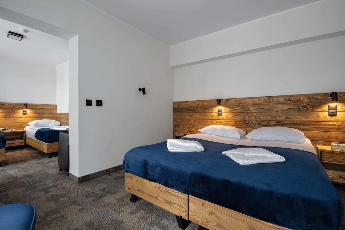 Habitación familiar | Sistema de insonorización, wifi gratis, ropa de cama