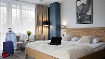 Quartos à prova de som, Wi-Fi de cortesia, roupa de cama