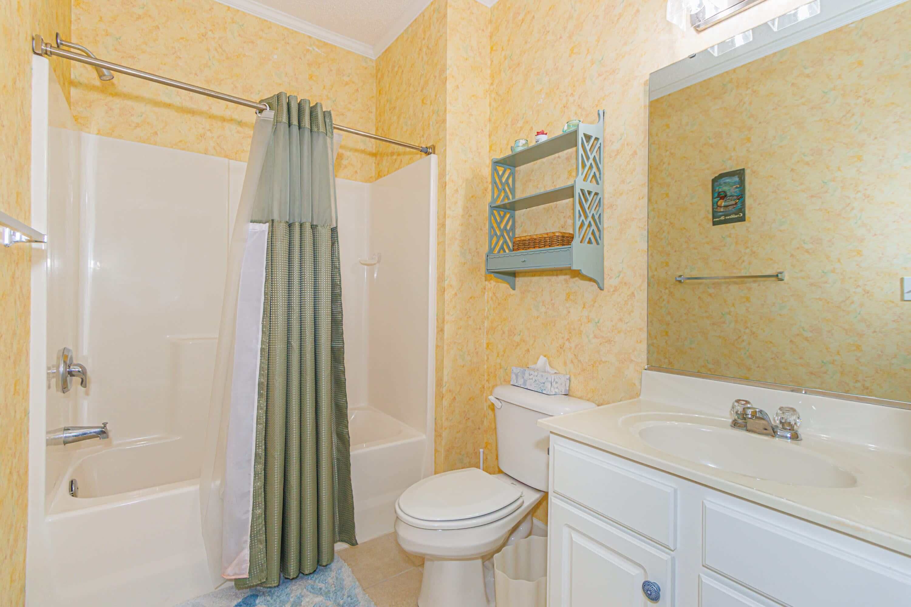 Shower, hair dryer, towels, shampoo