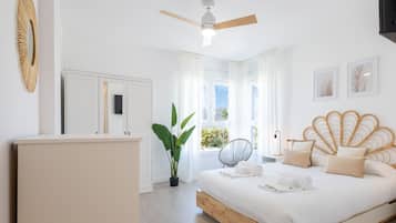3 habitaciones, tabla de planchar con plancha y cuna de viaje
