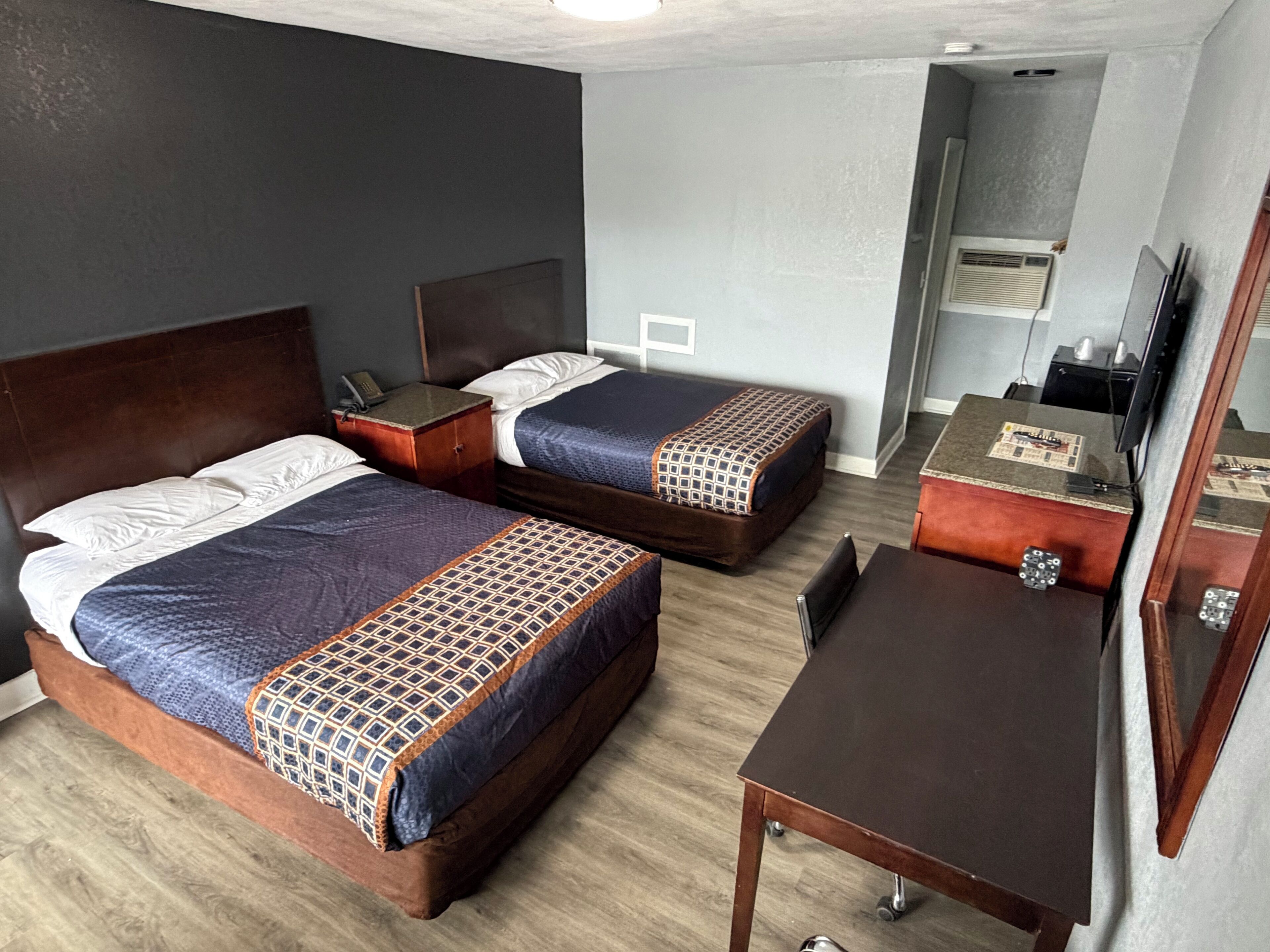 Combined shower/bathtub, towels, soap, toilet paper