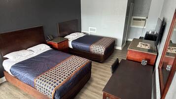 Combined shower/bathtub, towels, soap, toilet paper