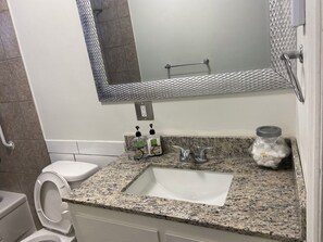 Hair dryer, towels, soap, shampoo
