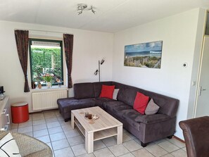 Casa premium, 3 quartos | Área de estar | Lareira