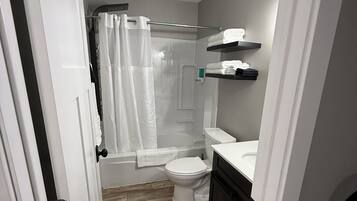 Hair dryer, towels, soap, shampoo