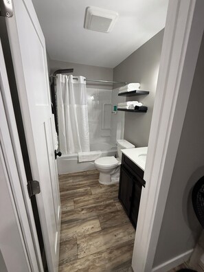 Hair dryer, towels, soap, shampoo