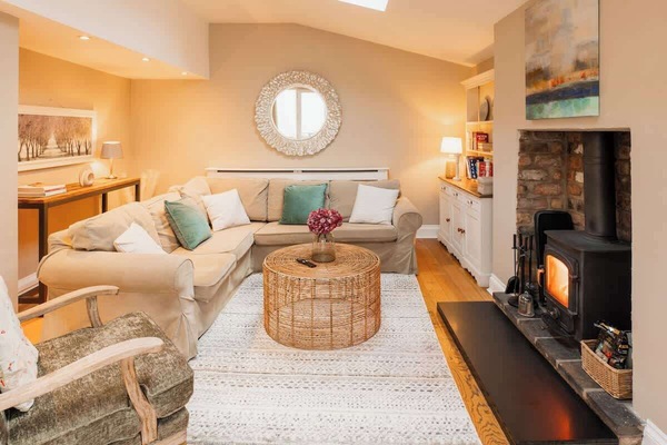 Large living space with books and games for relaxing! And Cosy log burner! (we supply a starter pack of wood)