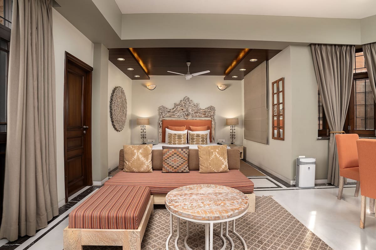Marigold Suite Balcony Garden View | 1 bedroom, in-room safe, blackout drapes, iron/ironing board