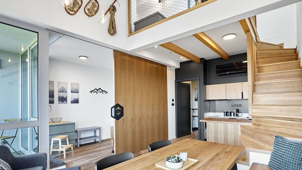 A modern kitchen with wooden cabinets and a built-in stove. - Lovely apartment for 6 people with WIFI, A/C, TV and balcony (Ostrov)