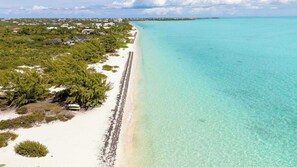 On the beach, sun loungers, beach towels