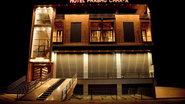 A multi-story building with a sign reading "HOTEL PRABHU CHHAYA". - Prabhu Chhaya Hotel (Kapasan)