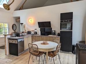 Fridge, microwave, dishwasher, dining tables